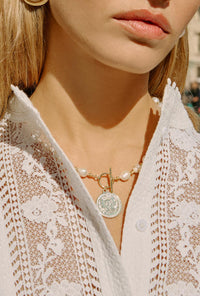 Petite Studio's Baroque Pearls and Gold Pendant Toggle Necklace 