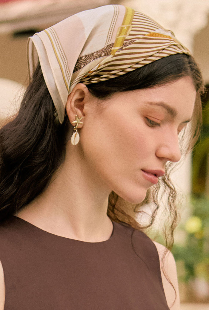 Petite Studio's Gold Starfish and Cowrie Shell Drop Earrings 