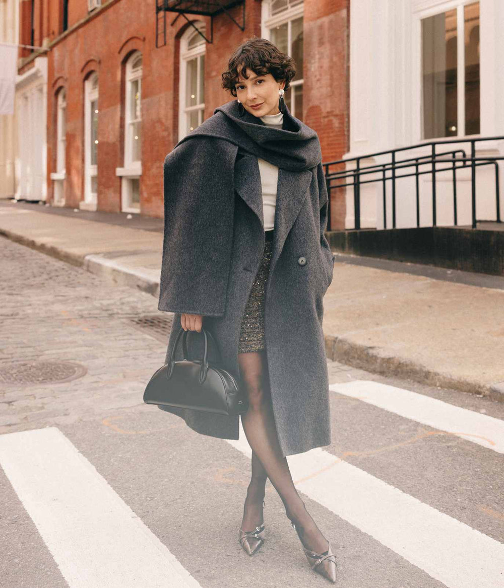 Model in NYC wearing Petite Studio winter coat