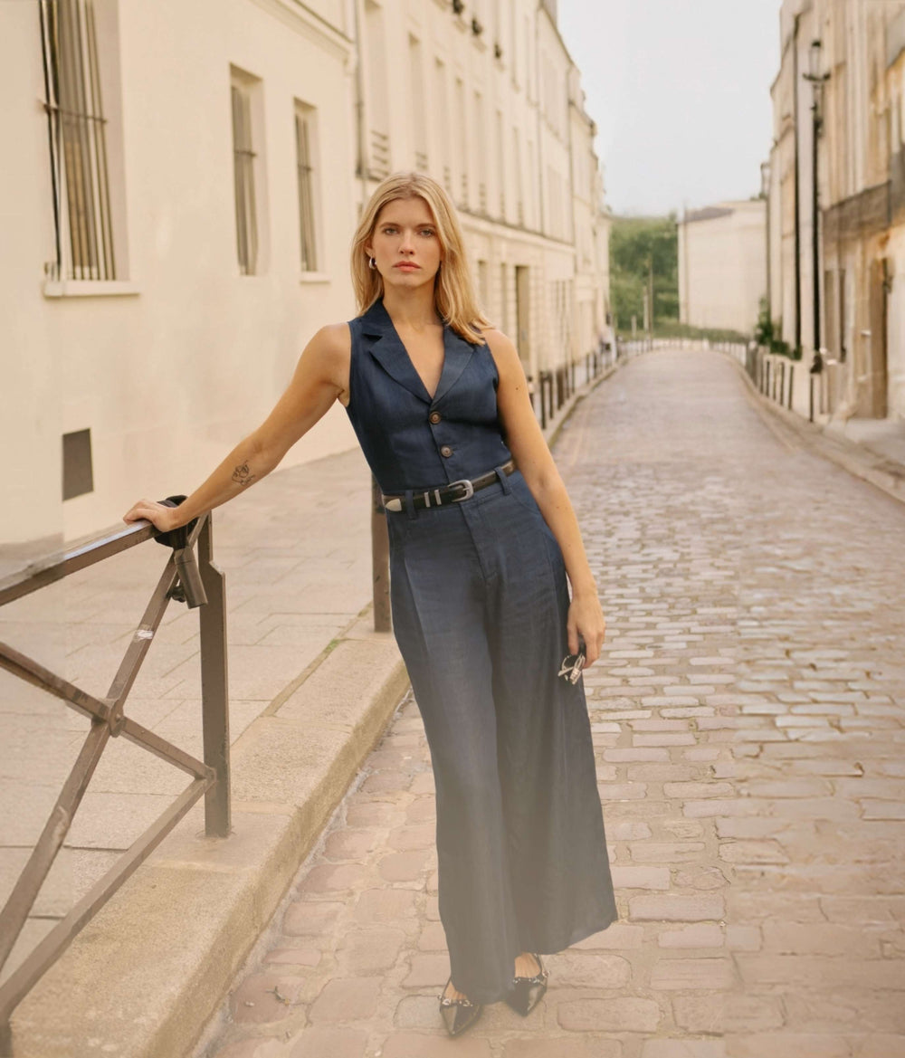 Petite model walking on the streat wearing Petite Studio Mitzi jumpsuit