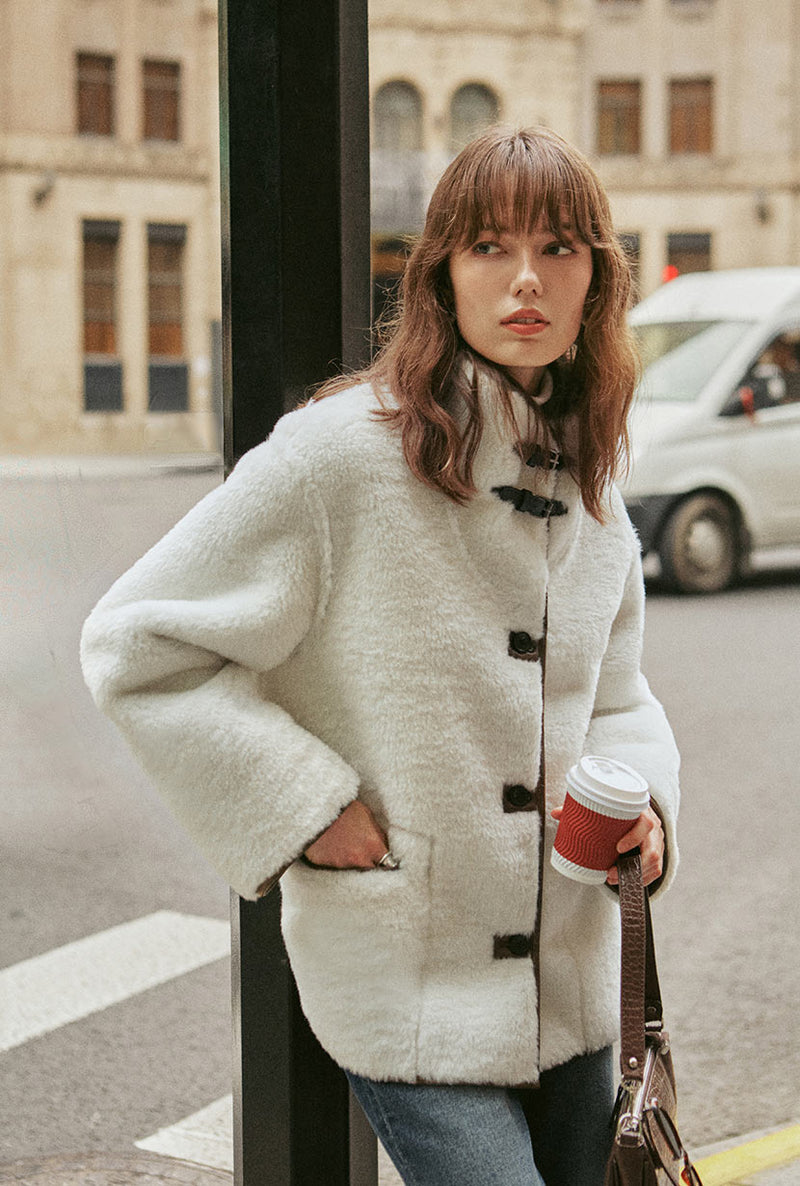 Petite Studio's Keisha Reversible Faux Fur & Leather Jacket in Ivory and Tawny