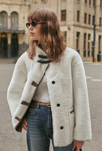 Petite Studio's Keisha Reversible Faux Fur & Leather Jacket in Ivory and Tawny