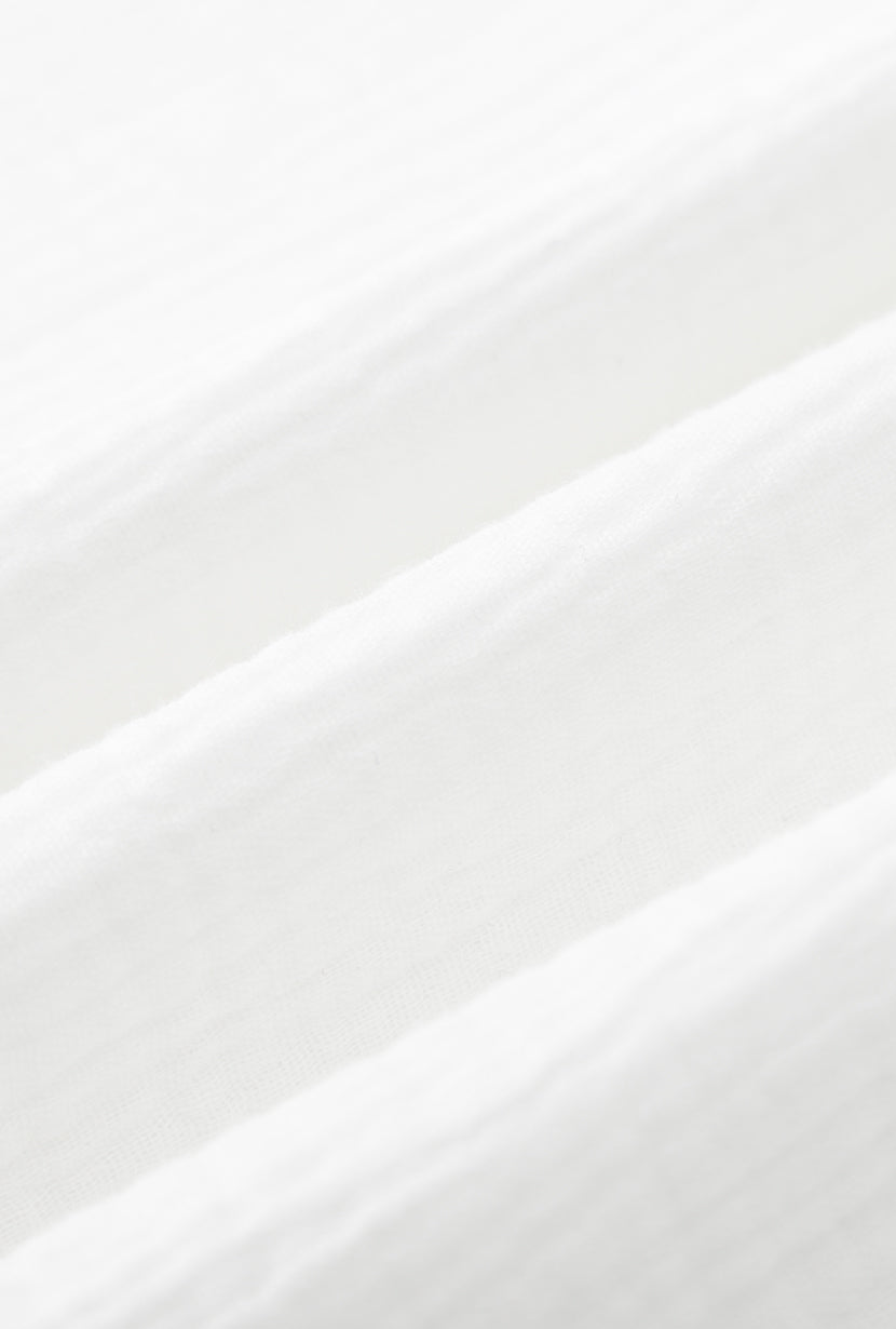 Petite Studio's Imogene Dress in White Eyelet 