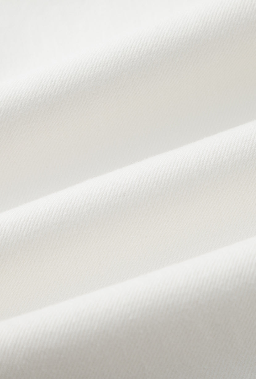 Petite Studio's Evie Mid-Rise Barrel Jeans in White 