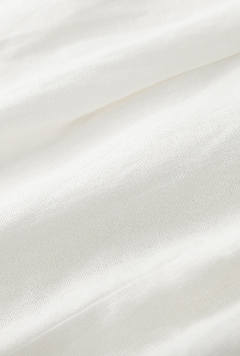 Petite Studio's Elodie Embroidered Linen Shorts in White