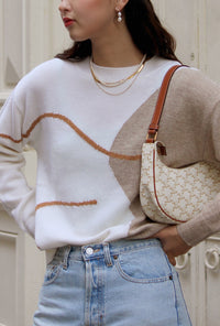 Petite Studio's oversized Lexi Wool Sweater in white & beige