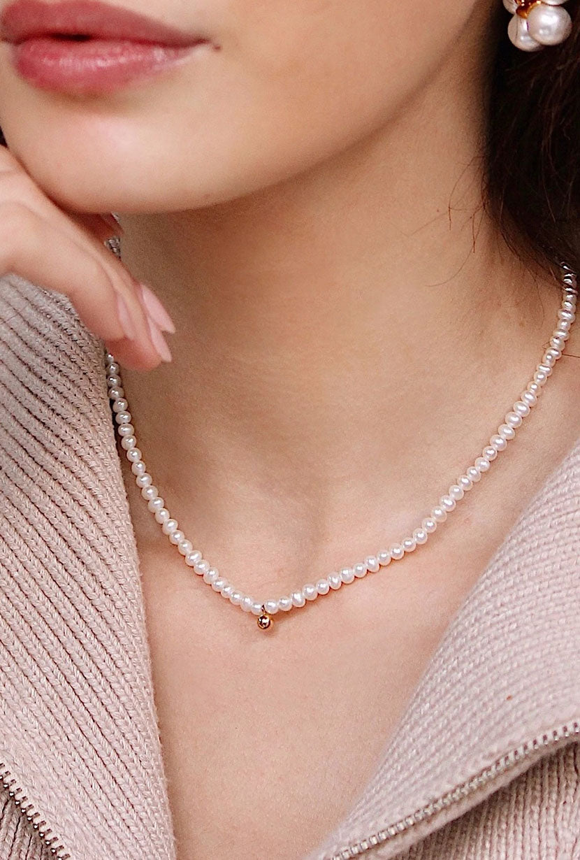 Petite Studio's Tiny Pearl Necklace